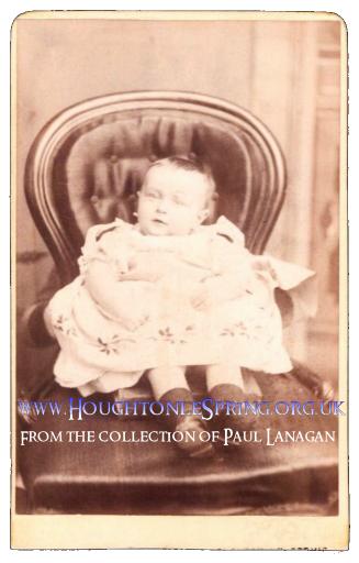A baby as photographed by C.Plews, Sunderland Street, Houghton-le-Spring