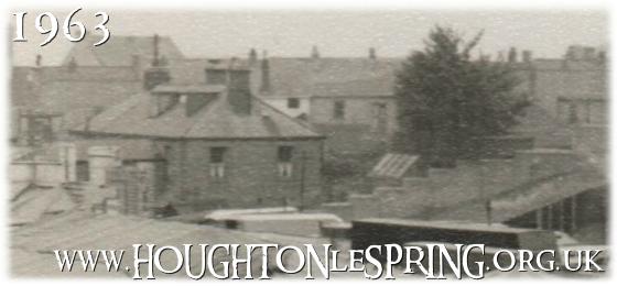 A rear view of Stocksfield Terrace, seen from the Lake fairground, 1963