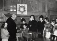 People in the wood-pannelled Boardroom in Houghton Hall