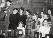 People in the wood-pannelled Boardroom in Houghton Hall