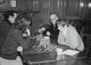 People in the wood-pannelled Boardroom in Houghton Hall