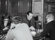 People in the wood-pannelled Boardroom in Houghton Hall