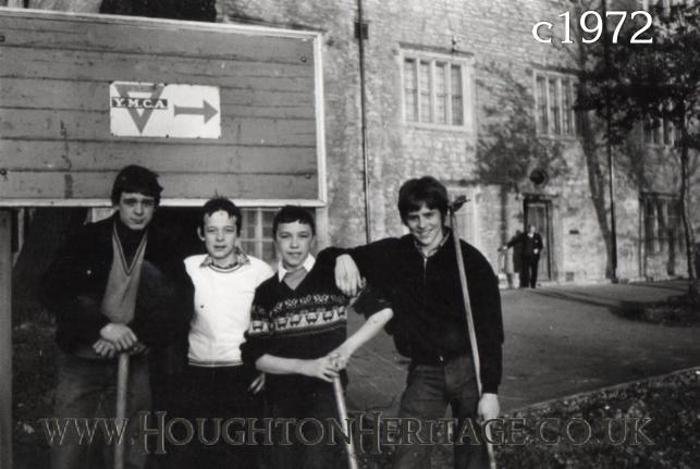 Young lads tidying up the front garden of the YMCA at Houghton Hall, guessed to be around 1972