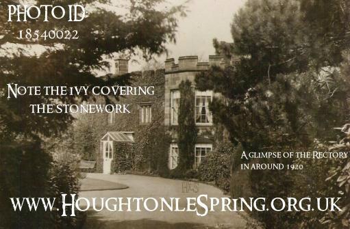 A peek at Houghton Rectory through the pine trees in around 1920